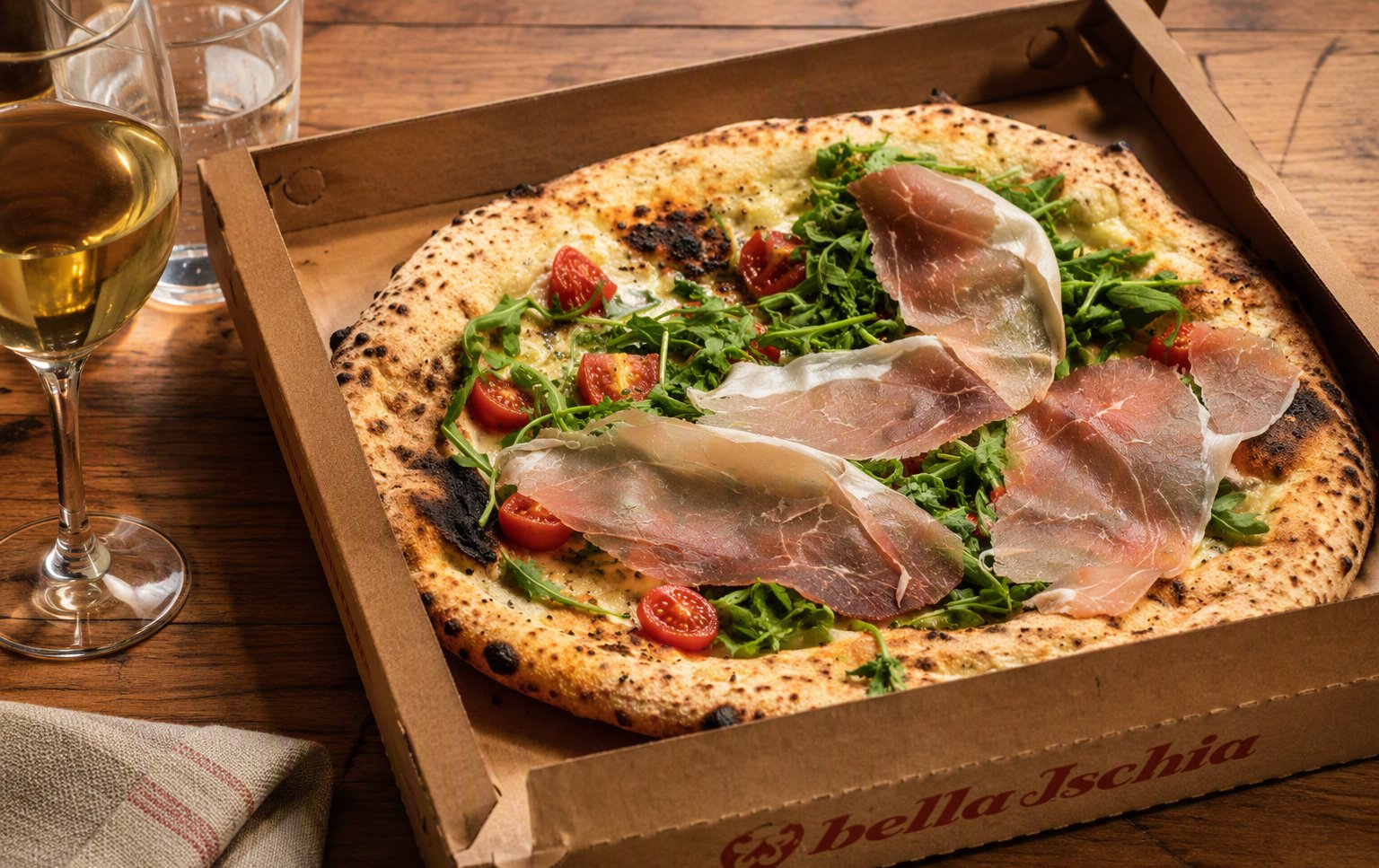 Pizza con prosciutto crudo e rucola